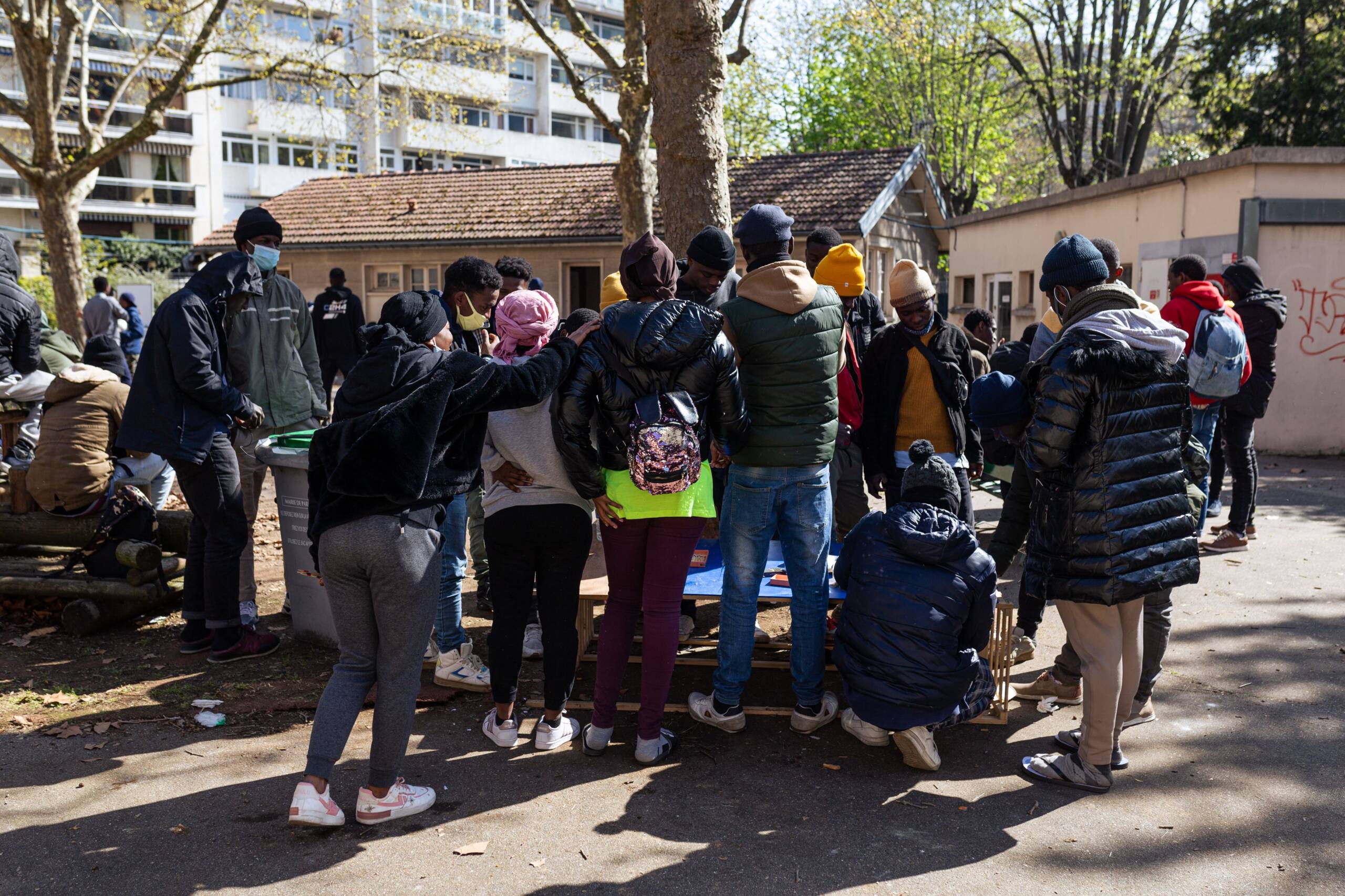 Mandatory Credit: Photo by Telmo Pinto/SOPA Images/Shutterstock (13861909m) A group of homeless young migrants are seen gathering in an abandoned school. More than 200 homeless young migrants occupied peacefully a disused school in Paris. Accompanied by associations Utopia 56, Timmy Association, Centre Tara and Le Midi du Mie the teenagers that were living on the streets of Paris for the last months, protest against the inhumane treatment of unaccompanied minors arriving in France from Africa. Occupation of abandoned school by homeless teenagers in Paris - 05 Apr 2023