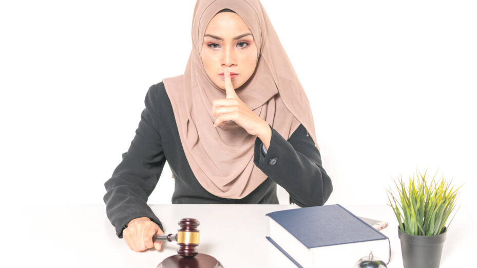 Hijab,Woman,With,Gavel,And,Hammer.,Law,Concept.