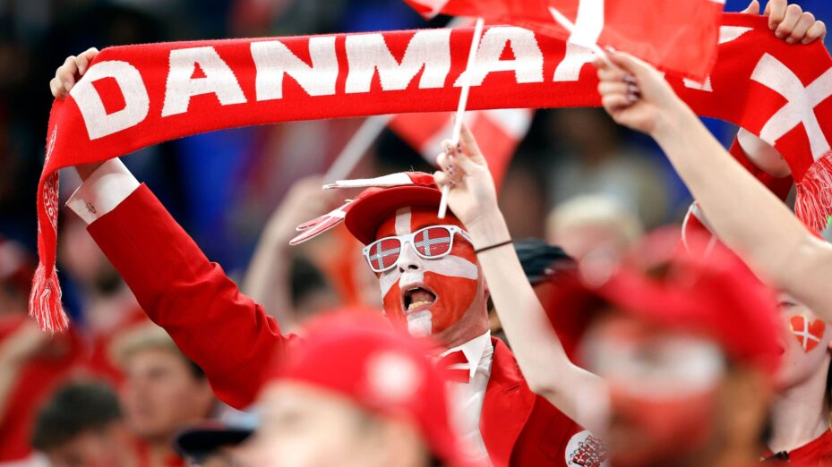 Mandatory Credit: Photo by STARSPORT/Shutterstock (13638800a)
Denmark's national football team supporters wave their flags during Fifa World Cup 2022, Group stage D, football match between France and Denmark
France vs Denmark, FIFA World Cup 2022, Group D, Stadium 974, Doha, Qatar - 26 Nov 2022
