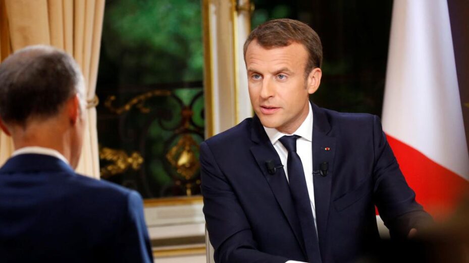French President Emmanuel Macron is seen during his first long live television interview on prime time at the Elysee Palace in Paris