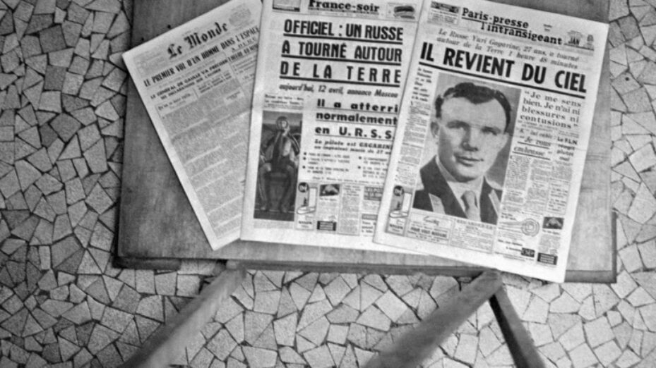 French newspapers announce the flight of Soviet Cosmonaut Yuri Gagarin, 12 April 1961. He became the first human to travel in space aboard Vostok I and the first to orbit the Earth. Yuri Gagarin died in a plane crash on a MIG-15 on a routine training flight, 27 March 1968. He was given a state funeral and was buried in the Kremlin wall facing Red Square. (Photo by AFP)